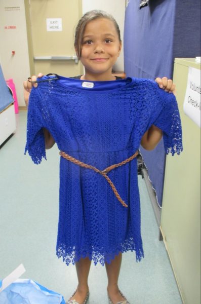 11 - Girl happy with her new blue dress