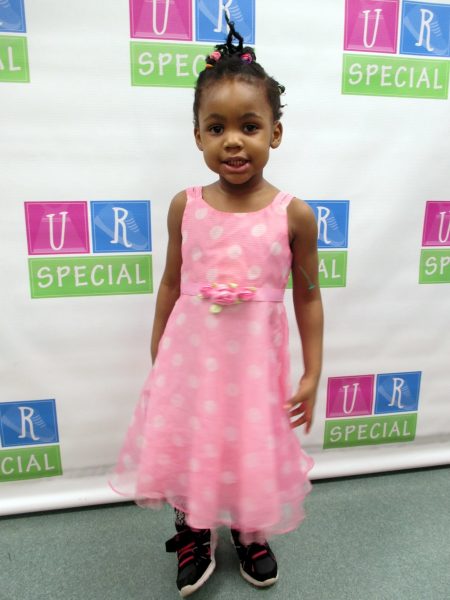 11 - Young girl with her new pink dress