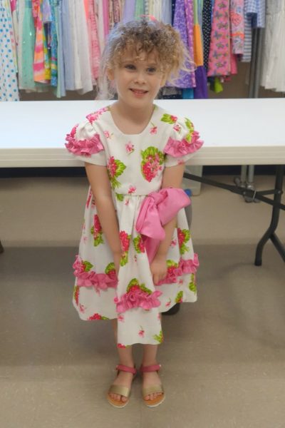 15 - A little girl with her new dress
