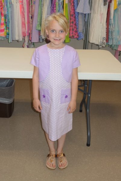 18 - A girl with her new purple dress