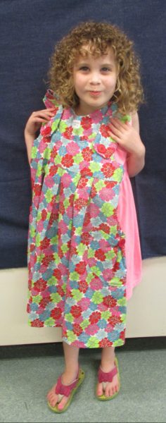 5 - Little girl with her new flower dress